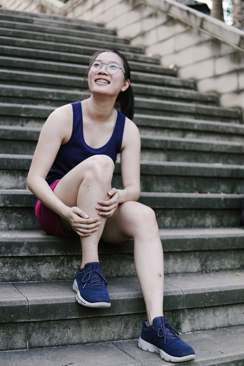 Active woman on stairs